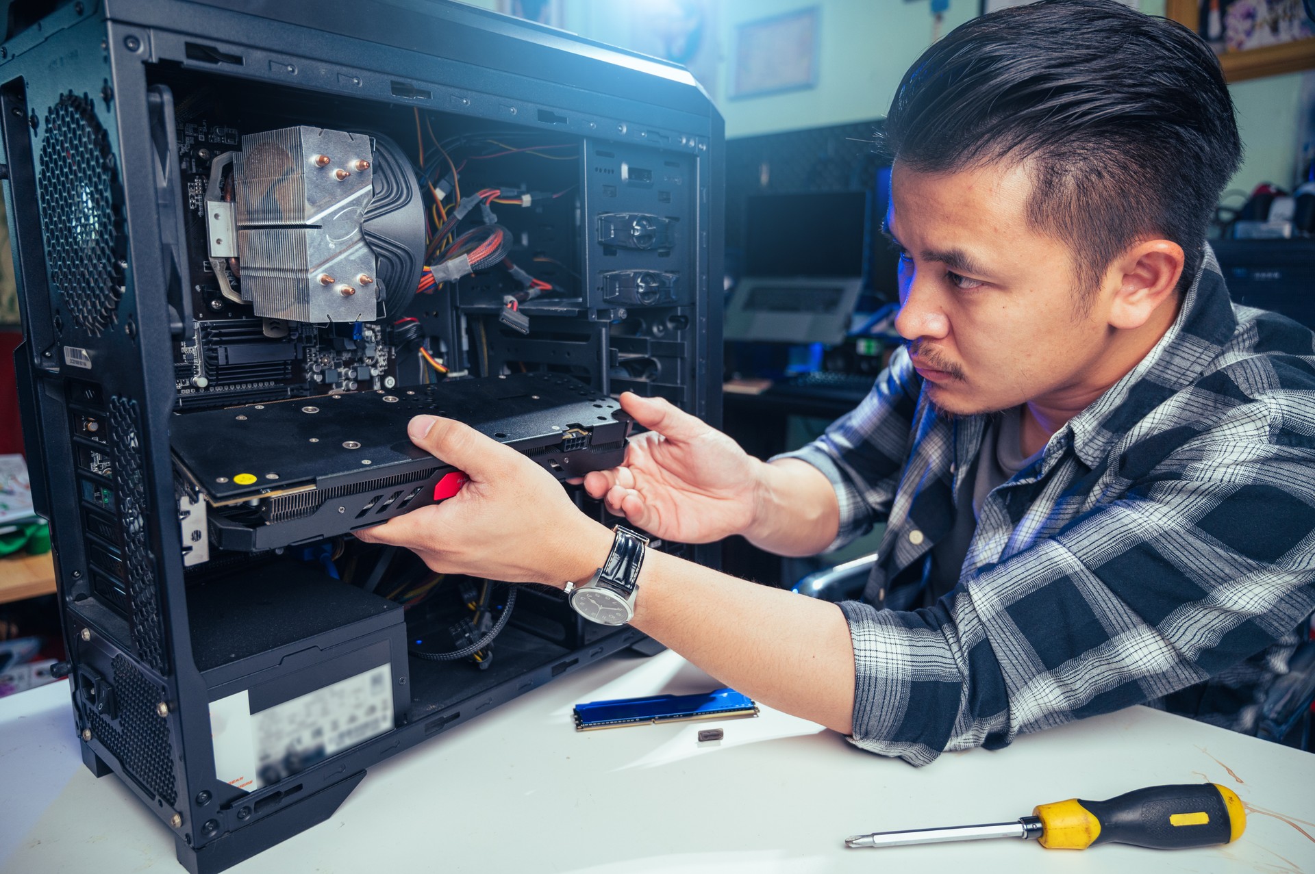 The technician repairing the computer. the concept of computer, CPU, motherboard, hardware, repairing, upgrade and technology.
